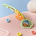 Close-up of Pearl Maiden Phone Strap Blind Box acrylic phone charm with colorful cord and playful BigGallery design
