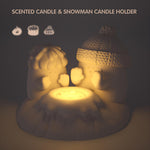 Stay Warm, My Friend Snowman Candle Holder Set glowing with a warm scented candle light