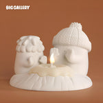 Stay Warm, My Friend Snowman Candle Holder Set by BigGallery with snowman figures and scented candle