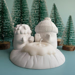 Stay Warm, My Friend Snowman Candle Holder Set displayed with snowy winter decor and scented candle