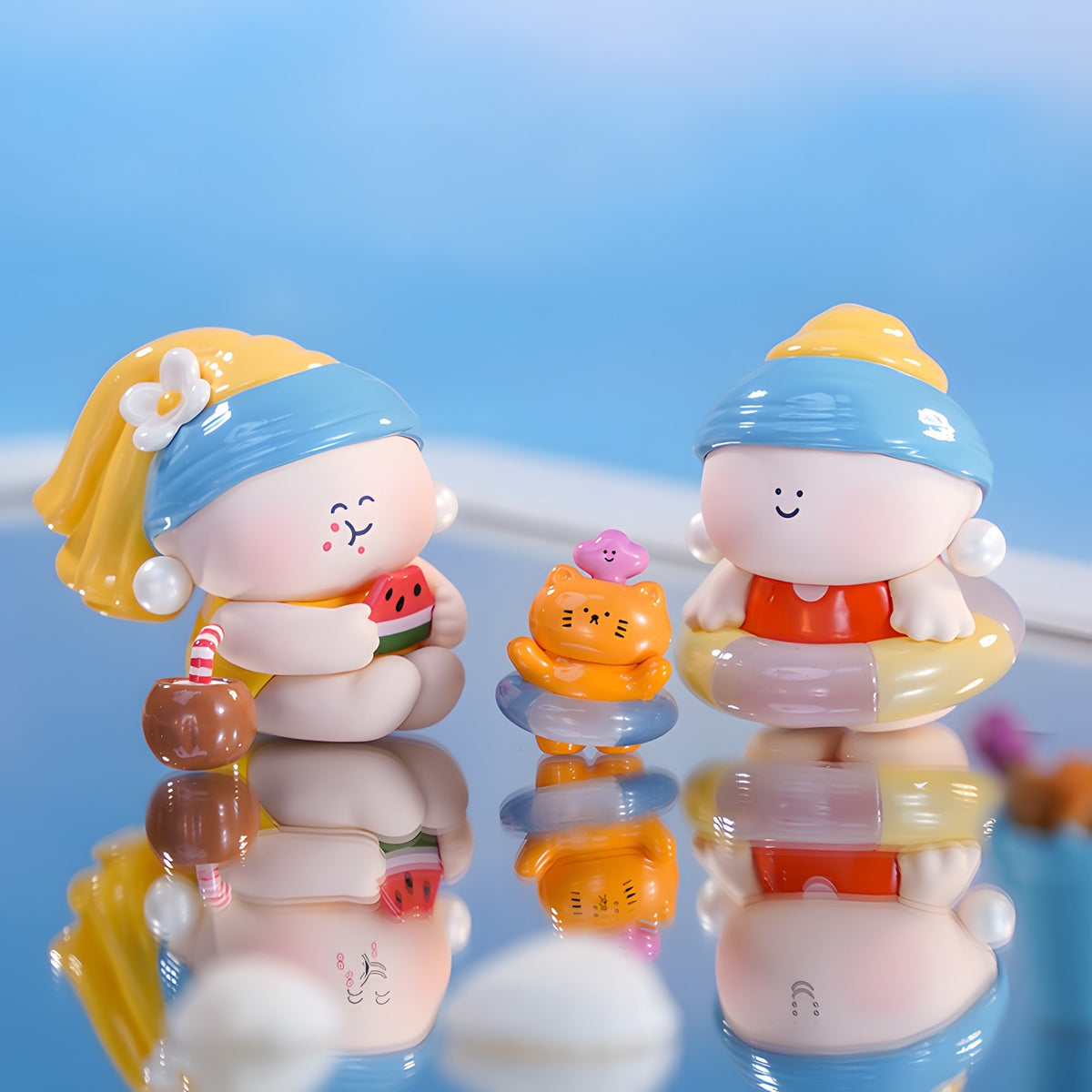Tender Moments Pearl Girl blind box figures in summer water scene with float ring and watermelon, playful collectible toys